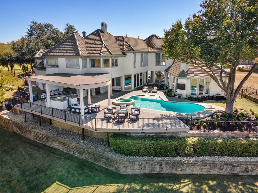 Iron fence surrounding luxury property